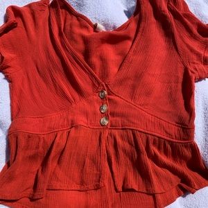 Coral/red blouse